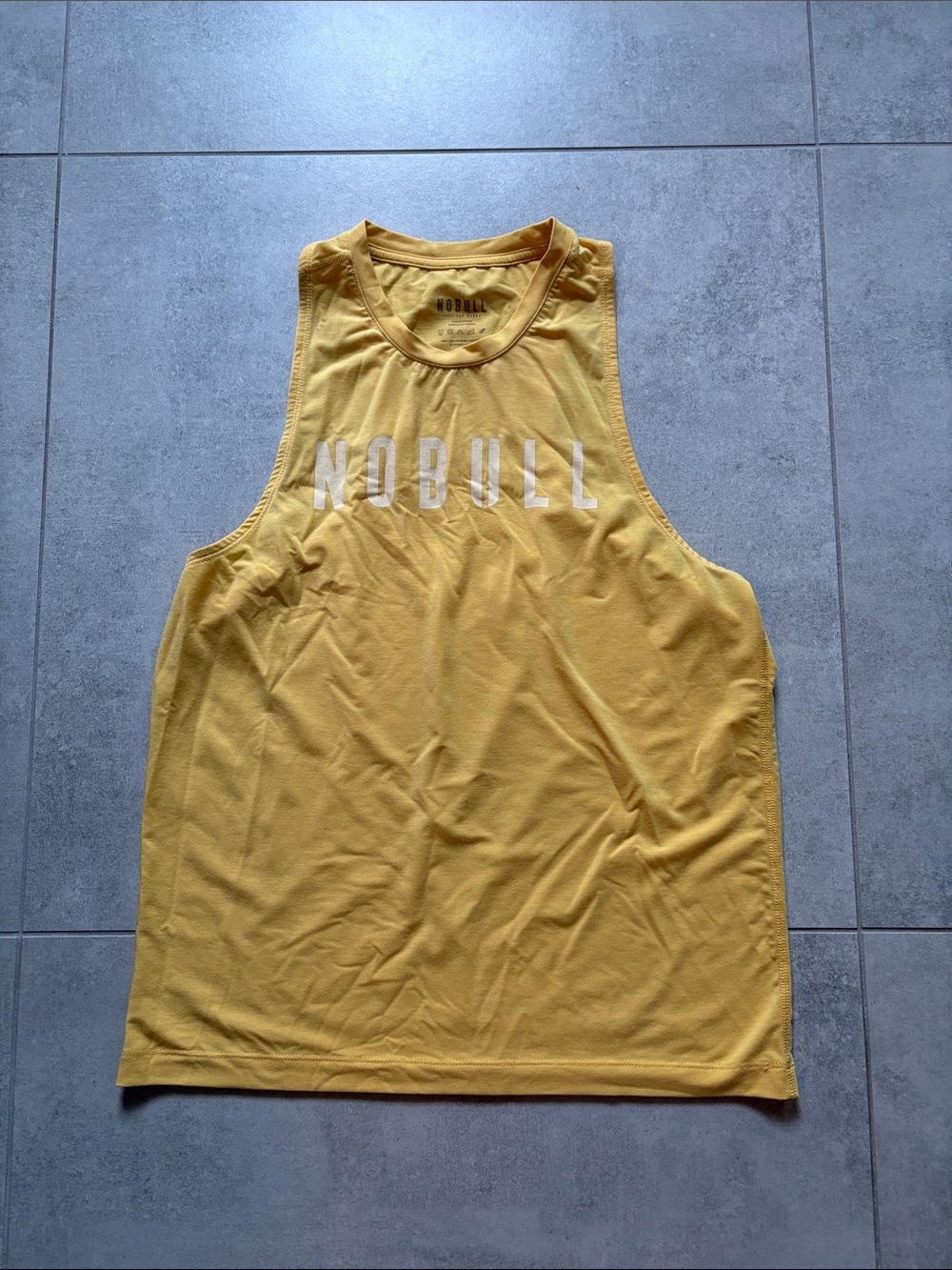 NOBULL Mustard Yellow Athletic Tank with White Logo